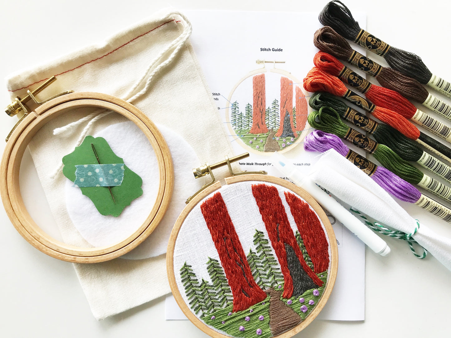 You will need: 4 inch wooden hoop, 6 inch square linen fabric, water soluble pen, 6 strand embroidery floss, needle, felt for backing, pattern, step-by-step instructions