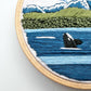 Closeup of Beginner Kit Orcas in the Sound showing stitch detail.