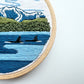 Orcas in the Sound Hand Embroidery PDF.  File includes pattern for transfer and booklet with easy to follow step by step instructions.  Part of the Pacific Wanderlust Collection.  Three Orcas swimming with Mountains in the background.