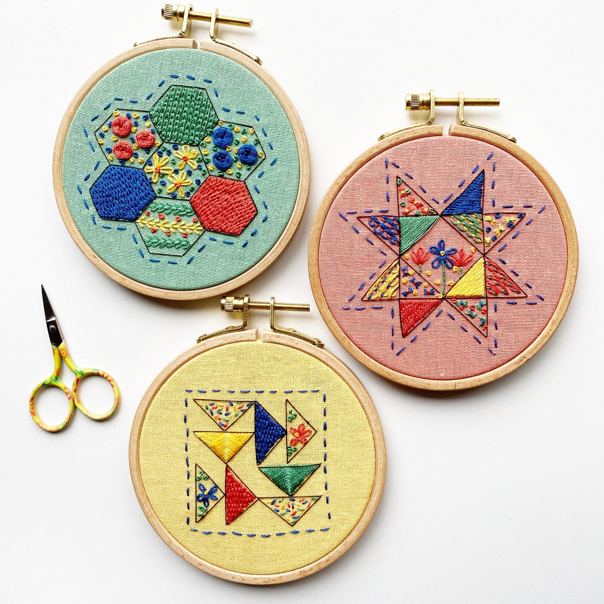 Rosanna Diggs Embroidery Seeing Starflowers  PDF.  Design features a modern take on the traditional star quilt pattern. Part of the RDE Modern Quilt Sampler Collection with Hexie Harmony and Triangle Tango.